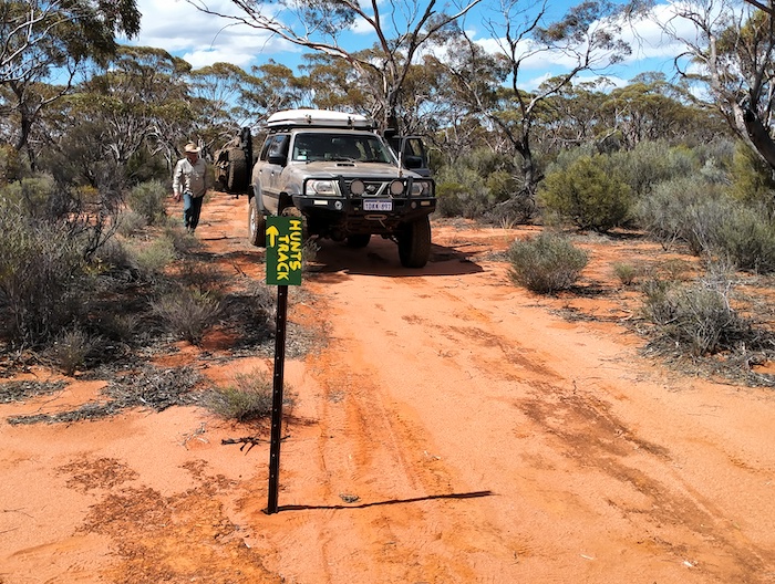 This sign previously directed travellers north to the sand quarry access track and then east to Gnarlbine Rock. The opening of the Track between Gnarlbine West and Gnarlbine East necessitated a repositioning of the sign.